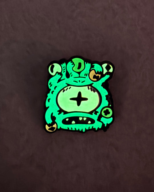 EyeHolder Enamel Pin (Glow Chase)