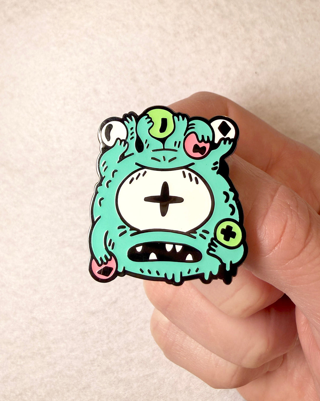 EyeHolder Enamel Pin (Glow Chase)