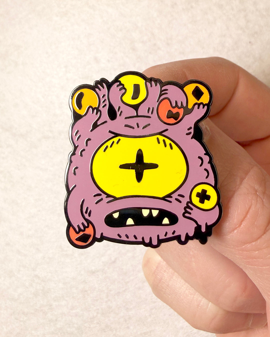 EyeHolder Enamel Pin